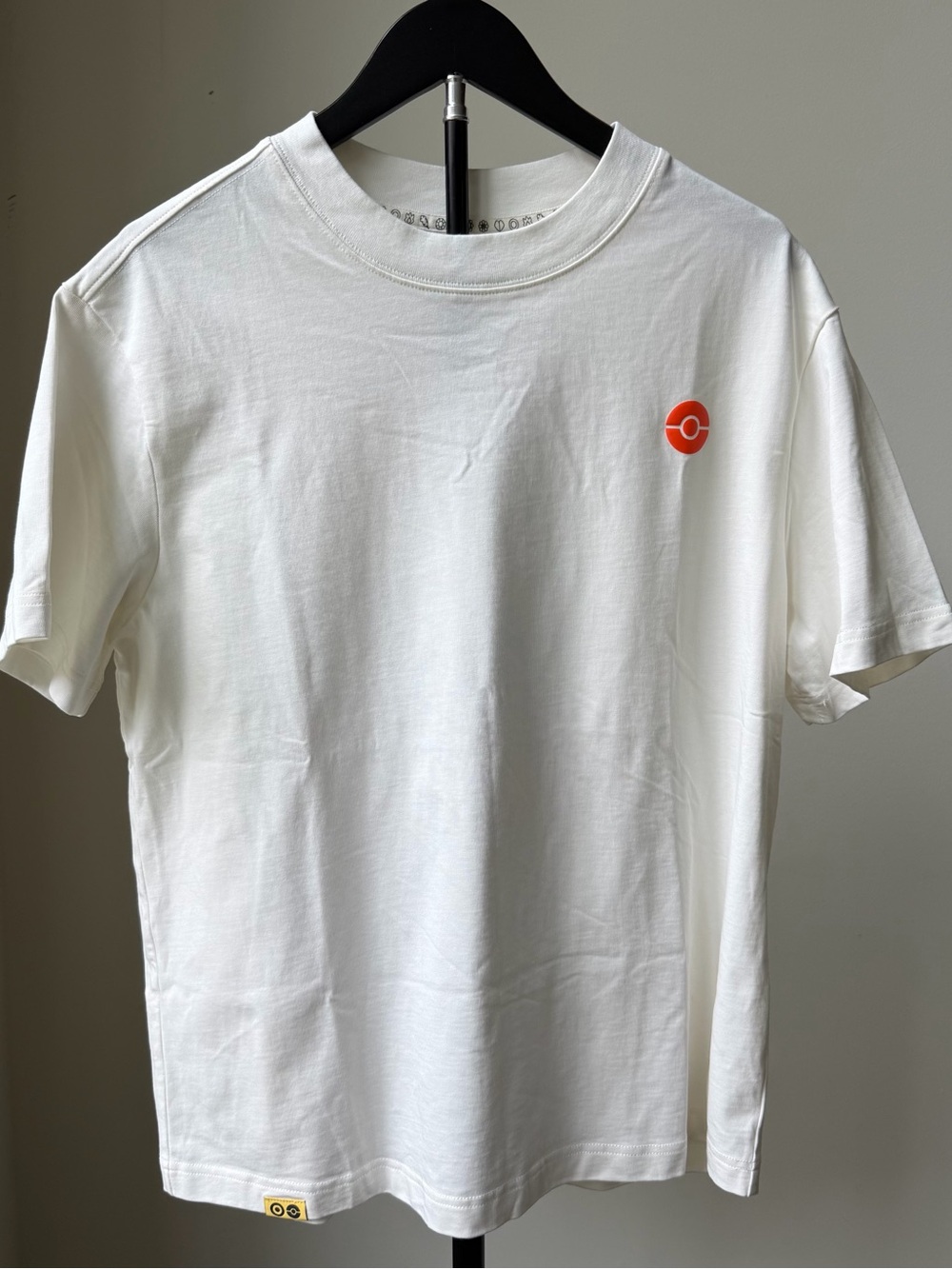 Pokemon White Short Sleeve Tee with Orange Pokeball Logo
